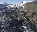 Two years after the eruption: A view upward showing the lower end of the lava flow and the glacier.