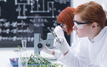 images of two scientists in a lab