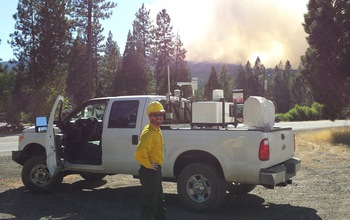 Scientists use a mobile atmospheric profiling system near the Eiler Fire in Calif. in July, 2014.