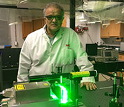 Aristides Marcano, professor of physics at Delaware State University, works in the school's laboratory of quantum optics.