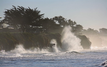 Big waves affect beach access and ocean bluffs at the Isla Vista, California study site.