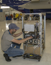 Scientists working on a data analysis console