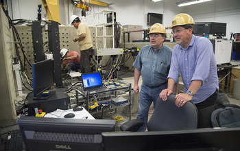 Antonio Bobet and Julio Ramirez in a Purdue lab