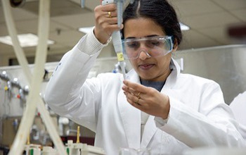 A researcher engages in biotechnology at the Madison Area Technical College in Wisconsin.