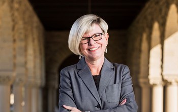 Shelley Correll, in a portico.