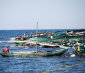 Fishers gather in their boats on Lake Victoria; local communities depend on the lake's fisheries.