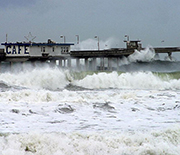 High surf during an El Niño storm batters coastlines and structures built there.