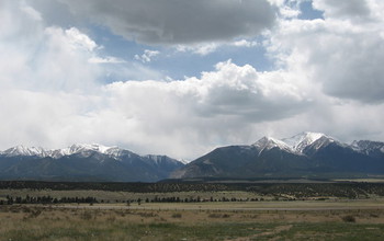 The Collegiate Peaks viewed from the Arkansas River Valley in Colorado.