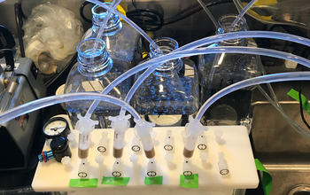 Machine in the field lab processing samples onto cartridges.