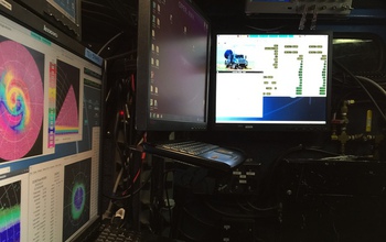 interior of the DOW truck, computer monitors and equipment