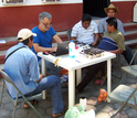 Men sitting at a table.