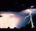 lightning over a field at night