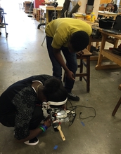 two students working in a makerspace