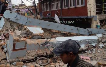 people and rubble following the Nepal earthquake of April 25, 2015.