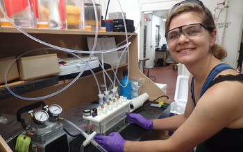 Scientist Laura Weber processes coral microbiome samples in a lab in the U.S. Virgin Islands.