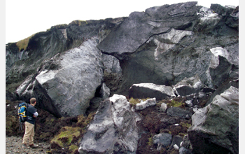 Studying a glacial exposure at the village of Kaktovik, Alaska