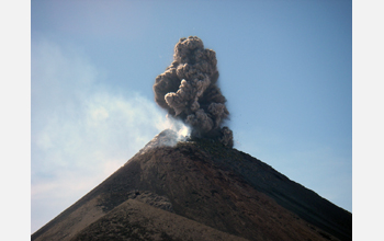 A small explosion from Fuego, an open vent volcano located 20 miles west of Guatemala City
