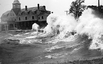 Waves crash ashore in Woods Hole, Massachusetts, during a 1938 hurricane