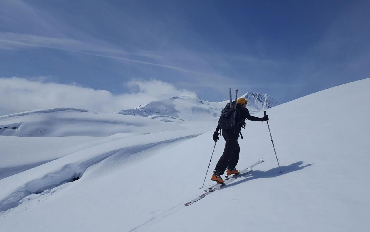 Skier on snowpack