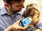 Using smartphone app to detect fluid behind eardrum