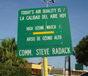 Road sign showing the quality of the air is high ozone watch