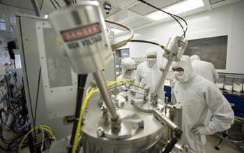 scientists in a lab working