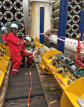 Shipboard scientists test valves and data loggers