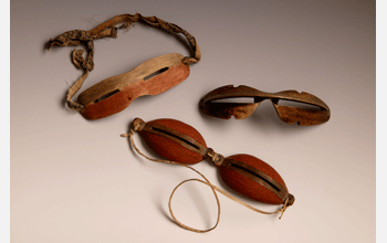 Snow goggles (igauget) used by Yup'ik Eskimo hunters to reduce glare and increase distance vision