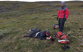 Michael O'Connor (left) and Stephen Ferencz sampling permafrost soil