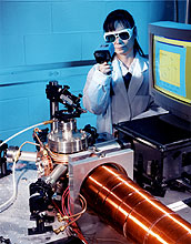 A scientist aligns the optics of the Atom Trap Trace Analysis technology, or ATTA for short