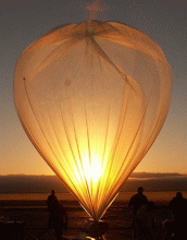 A hurricane-tracking driftsonde shimmers during a sunrise test.