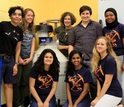 Biologist Liliana Dávalos conducting research in the lab with graduate and undergraduate students.