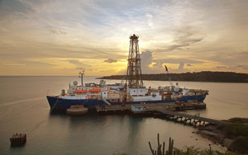 Photo of the drill ship JOIDES Resolution returning from an expedition.