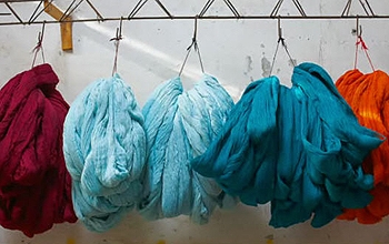 Bundles of material dyed different colors