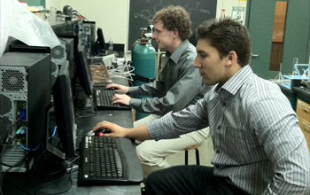 Students at Merrimack College in a computer lab performing virtual HIV screens