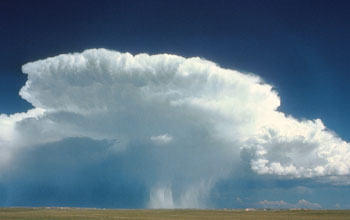 Ominous clouds signal a thunderstorm over Great Plains.