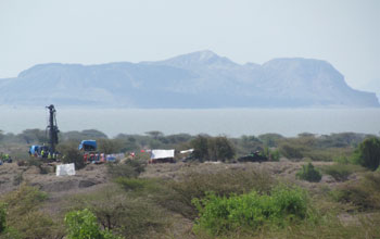 Lake Turkana and vehicles on it banks in Kenya