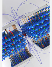 Artistic visualization of the atomic and magnetic moment structure of chromia.