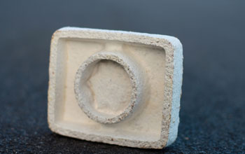 Close-up image of biodegradable packaging material, made from mushroom and agricultural waste.