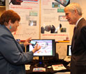 Photo of Sen. Bingaman with educational technology called Math Snacks.