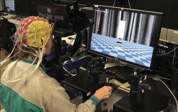 a person using equipment that may help rehabilitate Parkinson's disease patients.