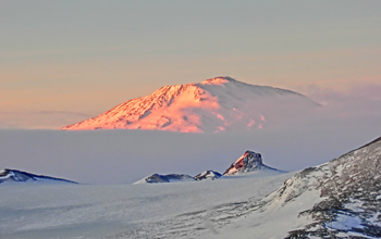 Mount Erebus, the southernmost active volcano on Earth, can be seen in the background