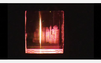 Series of holograms inscribed by a laser into the photorefractive polymer screen.