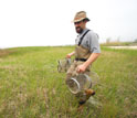 Photo of biologist Andrew Whitehead at the Bay St. Louis field site.