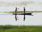 Fishermen on Botswana's Chobe River, site of the study of floodwaters and disease.