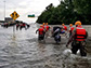 First responders performing rescues during floods from Hurricane Harvey's rains