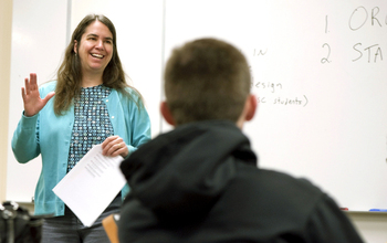 professor and teacher in a class