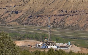 fracking tower in a field