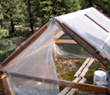 Photo showing a greenhouse warming experiment where scientists measure carbon dioxide.