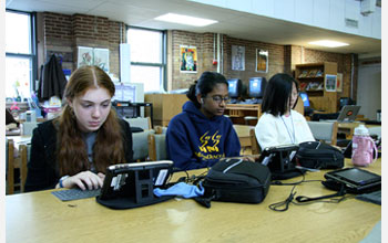 Photo of students using  digital game-based learned on computers.